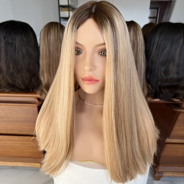 Experience luxury with the Golden Luxe Silk Top Lace Wig, crafted from 100% Virgin Human Hair. This 20-inch wig features a silk top and lace base for a natural scalp effect, sleek straight texture, and radiant blonde tone, perfect for elegant and versatile styling.